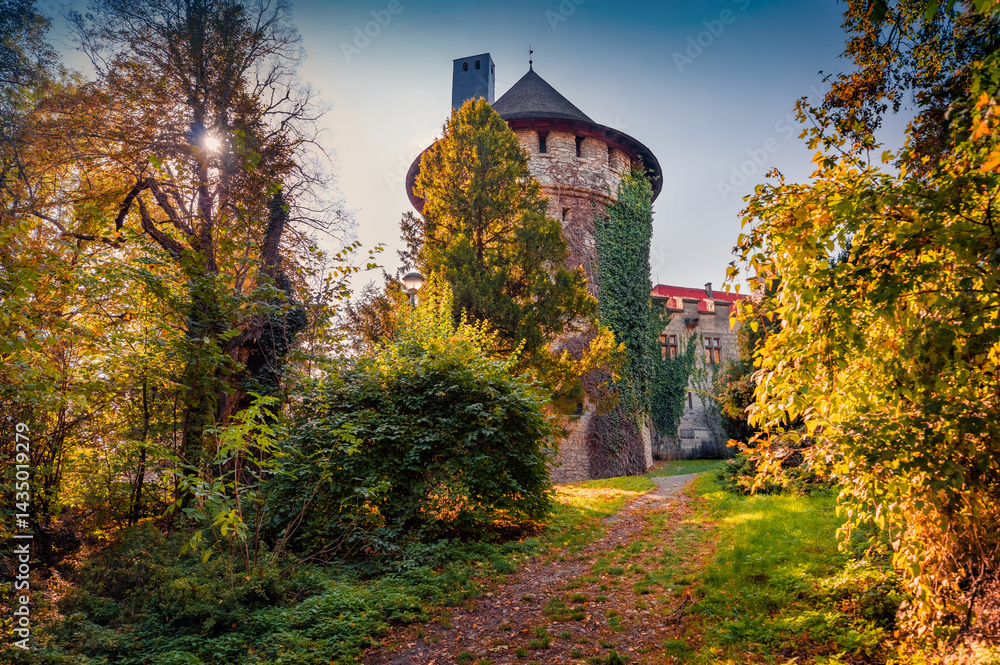 Superb autumn view of Smolenicky castle. Exciting morning cityscape of Smolenice village, municipality of Trnava District, Slovakia, Europe. Traveling concept background.