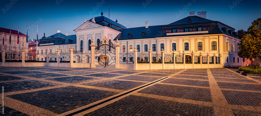 Bratislava, Slovakia-October 29, 2024: Panoramic autumn view of illuminated Government office - Presidential Palace. Wonderful morning cityscape of Bratislava, capital of Slovakia, Europe.