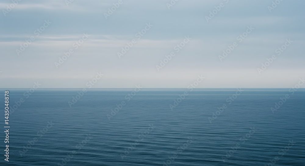Serene Ocean Horizon Calm Waters Under a Cloudy Sky Serene Ocean Horizon Calm Waters Under a Cloudy Sky