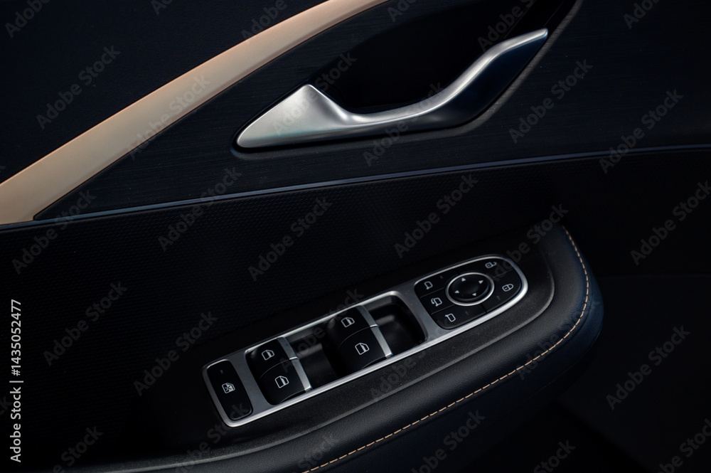 Naklejka premium Car door with door handle and window control and adjustment button
