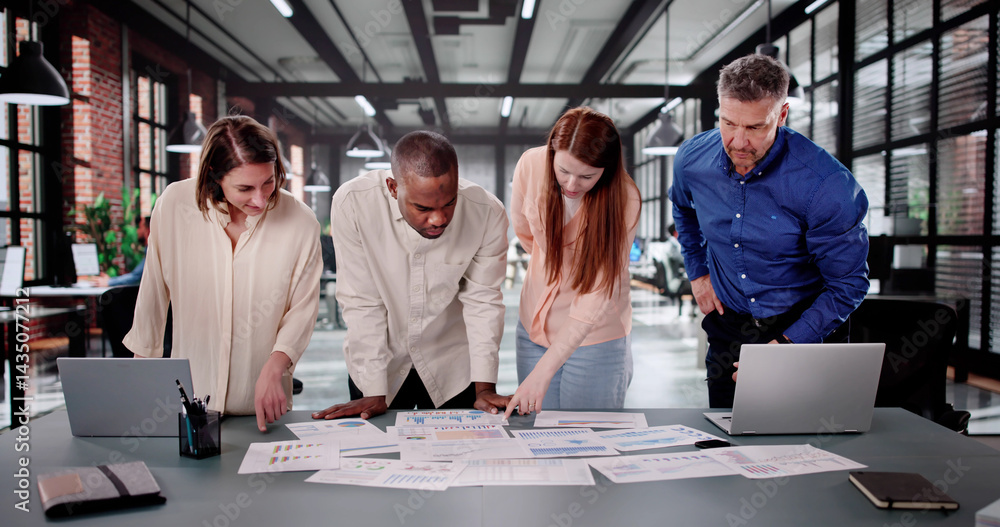 Diverse Analyst Group Meeting To Discuss Financial Data