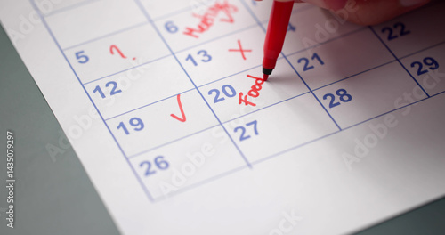 Calendar Deadline. Young Man Holding Pen Marking