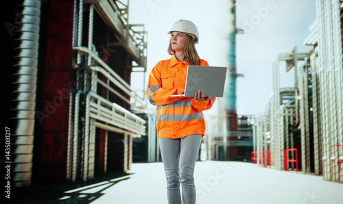 Obraz na płótnie Quality Control In Energy Industry: Woman Inspecting Pipeline w salonie