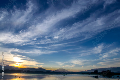 the beauty of the sunrise and the exotic clouds above