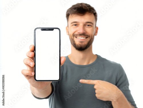 Obraz na płótnie Man holding cellphone: A smiling man presents a blank cellphone screen, inviting viewers to engage with a modern device's technology. w salonie