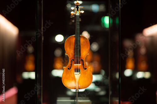 Violinmaking historical masterpieces on Display in Treasure box room in violin museum Cremona, Italy