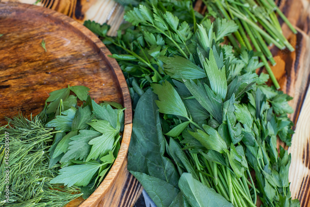 fresh greens from the garden, prepared for summer salad in the country.