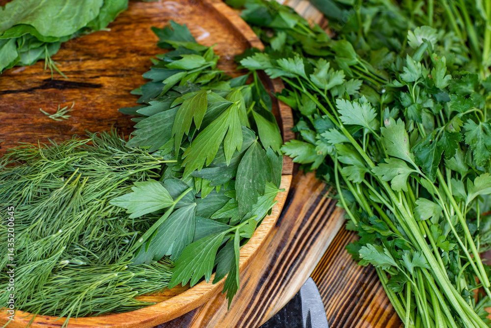fresh greens from the garden, prepared for summer salad in the country.