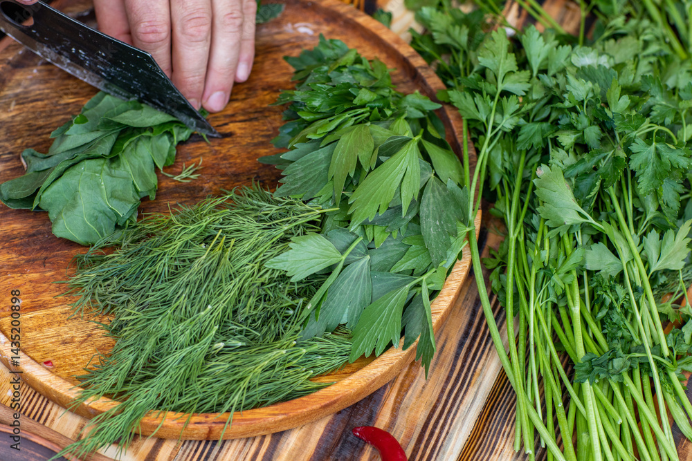 fresh greens from the garden, prepared for summer salad in the country.