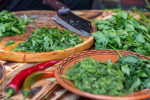 Obraz na płótnie fresh greens from the garden, prepared for summer salad in the country. w salonie