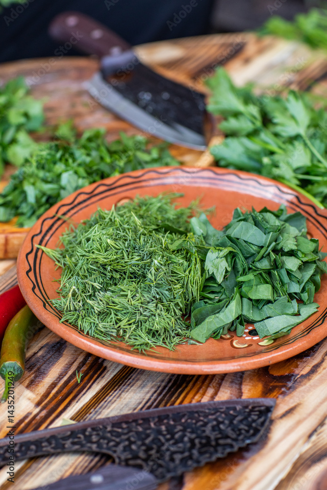 fresh greens from the garden, prepared for summer salad in the country.