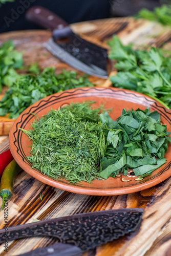Obraz na płótnie fresh greens from the garden, prepared for summer salad in the country. w salonie