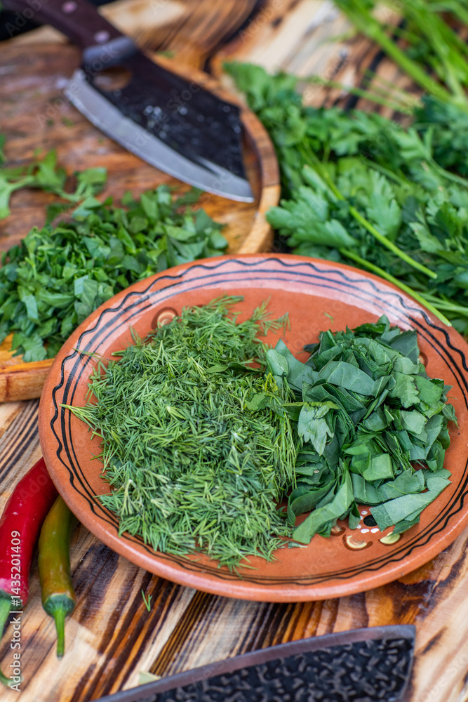 fresh greens from the garden, prepared for summer salad in the country.