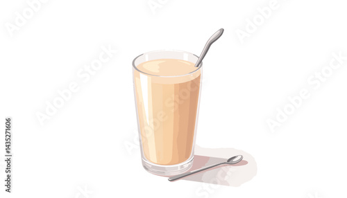 Creamy beverage in a tall glass with a spoon  