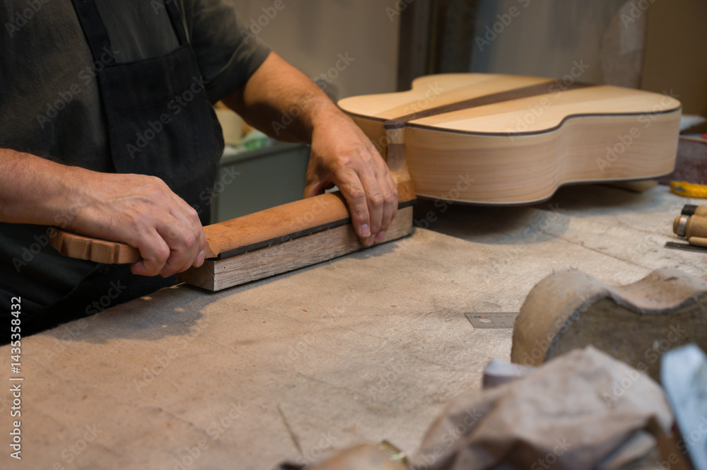Fotografie Luthier at work in his workshop