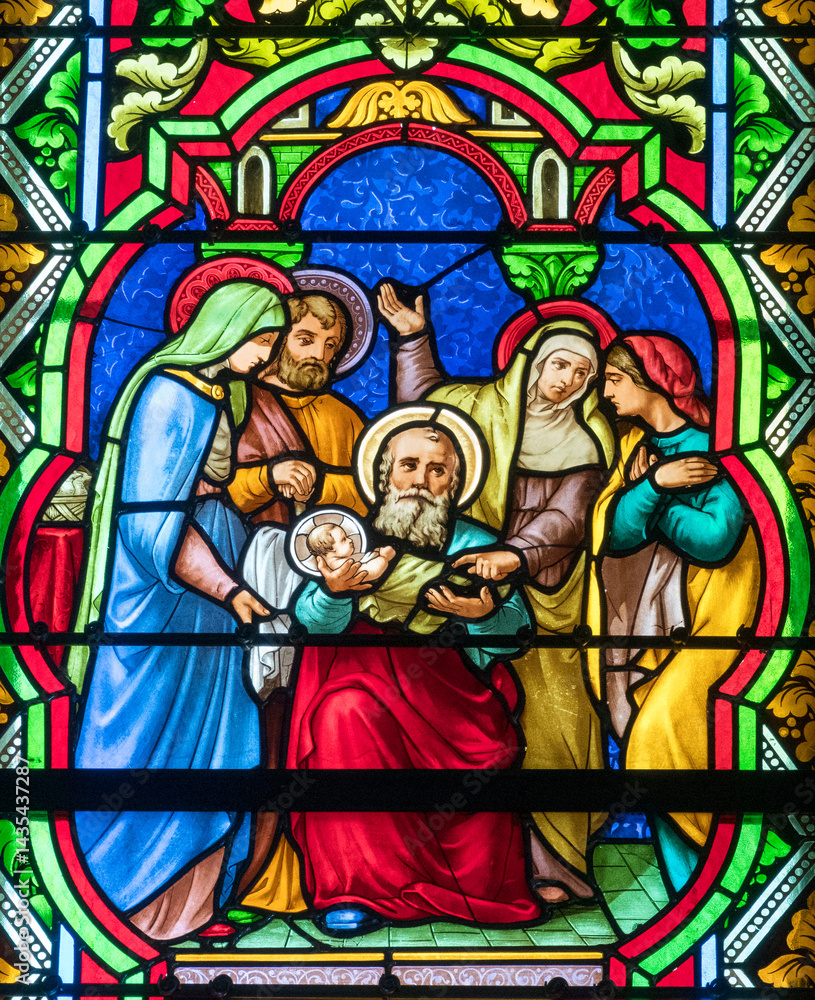 Fototapeta premium Stained glass (19th century) Saint Joachim holding baby Jesus Christ in his arms.
