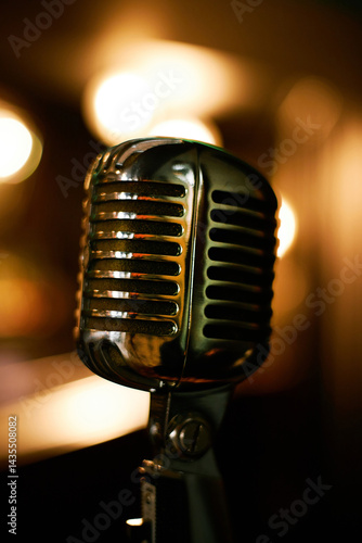 Photography Vertical close up shot of old fashioned microphone standing on stage of jazz clu