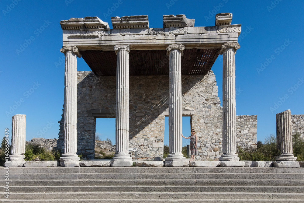 Image of historical ruins, columns, ancient theater and temples in the ancient city of Priene. Image of historical ruins, columns, ancient theater and temples in the ancient city of Priene.
