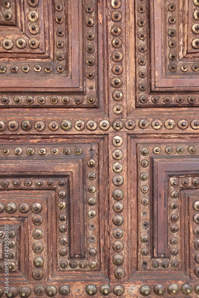 DETAIL OF AN OLD WOODEN DOOR DETAIL OF AN OLD WOODEN DOOR