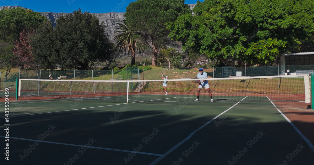 Fototapeta premium Fitness, sport and mature people with racket, performance and playing of game for exercise, healthy and active. Outdoor, training and athlete with equipment for workout, match or confident for tennis