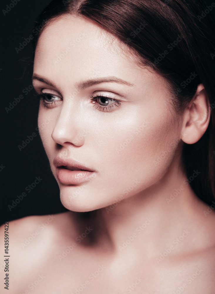 Fashion beauty portrait of young brunette woman with natural makeup and perfect clean skin. Pure model with posing in studio Fashion beauty portrait of young brunette woman with natural makeup and perfect clean skin. Pure model with posing in studio