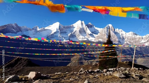 Himalayan Mountains with Traditional Prayer Flags - Sacred Landscape 4K The scene captures the spiritual and natural beauty of the region, with traditional Buddhist prayer flags in various colors