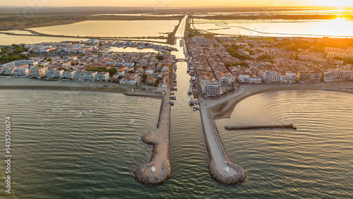 Obraz na płótnie Aerial view of the Grau du Roi fishing village at sunrise in Camargue, France w salonie