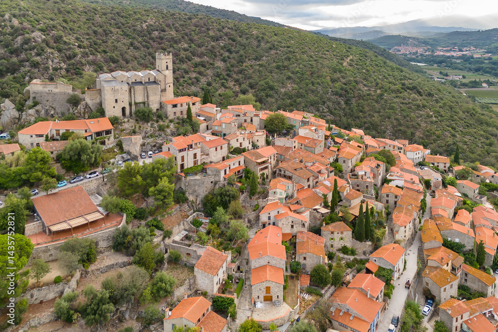 Aerial view of Eus, the medieval hilltop town in Pyrenees mountains, France.