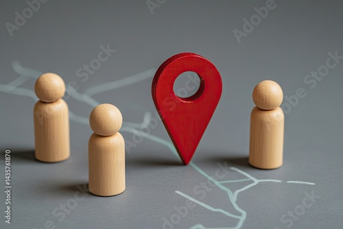 Navigation, people, and destination.  Wooden figurines stand on a map, facing a red location pin
