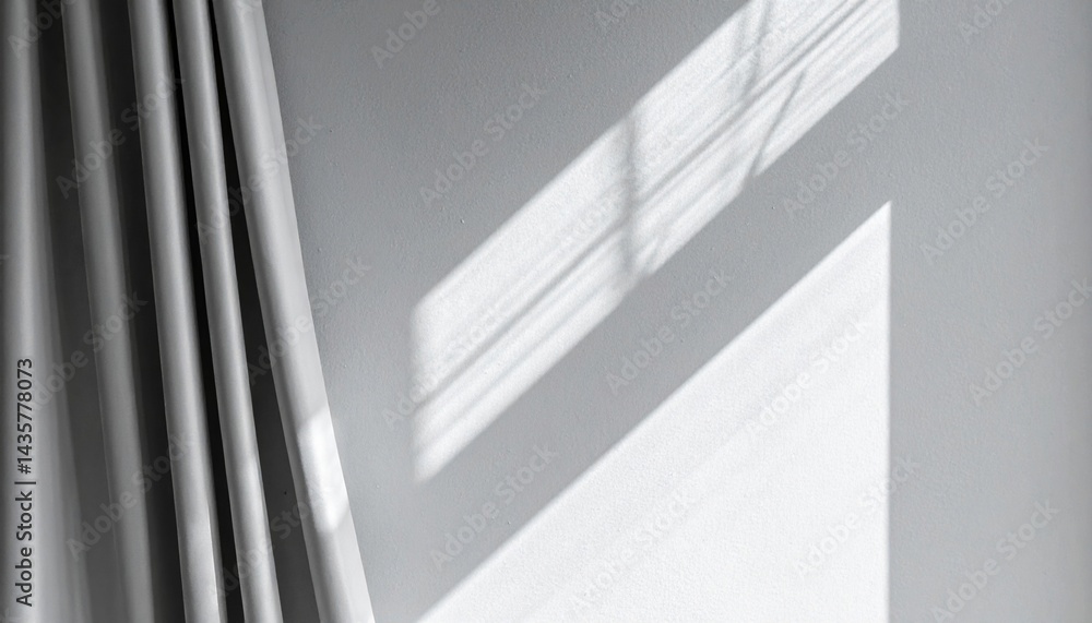Fototapeta premium Natural light casting shadows through curtains modern interior photography minimalist space soft perspective serenity