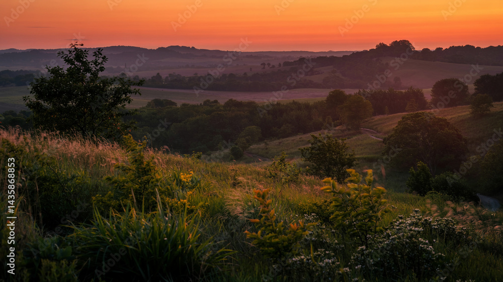 casting an orange glow on the landscape casting an orange glow on the landscape