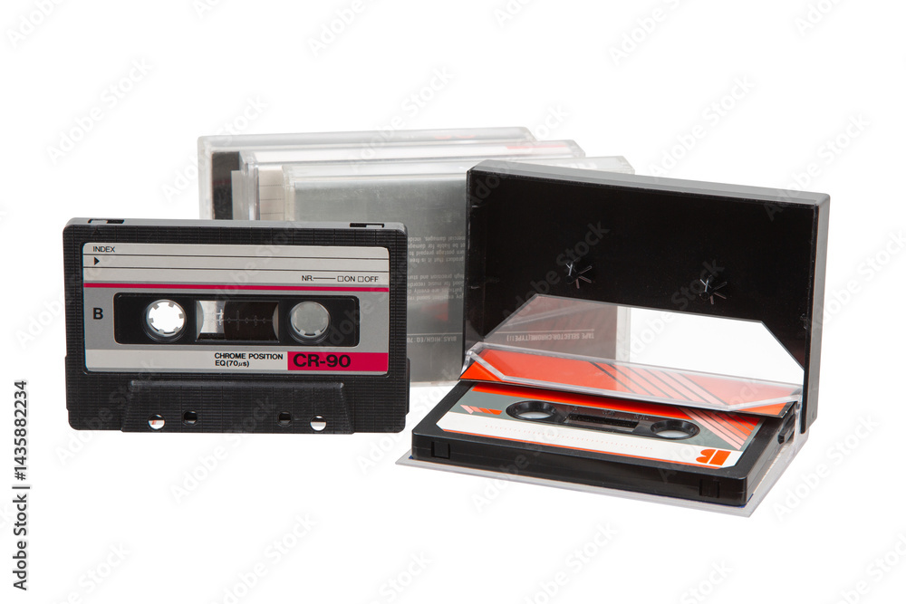 Close-up of an audio cassette with a sticker without text. Analog storage medium. Cassettes for audio recordings and music. Close-up of an audio cassette with a sticker without text. Analog storage medium. Cassettes for audio recordings and music.