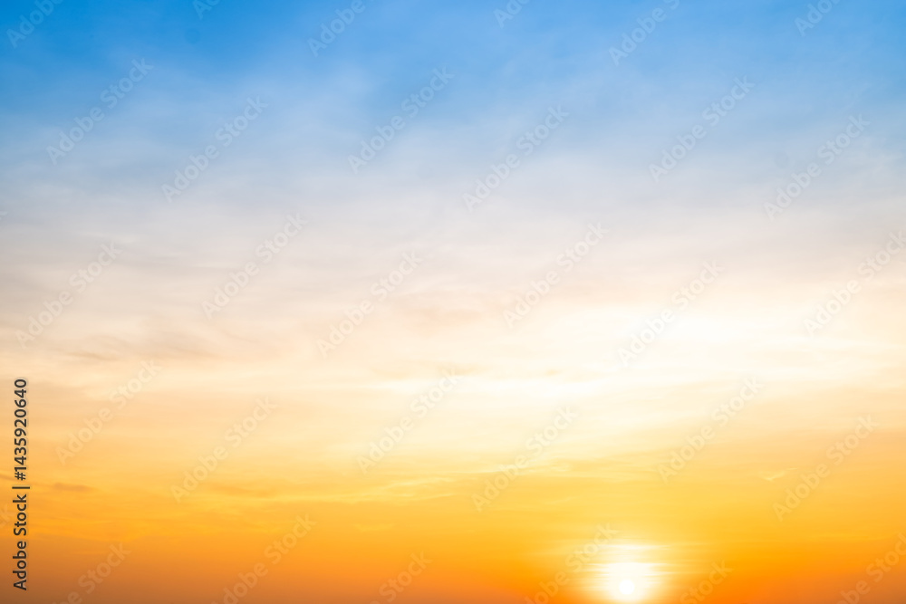 Fototapeta premium Beautiful , luxury soft gradient orange gold clouds and sunlight on the blue sky perfect for the background, take in evening,Twilight, Large size, high definition landscape photo
