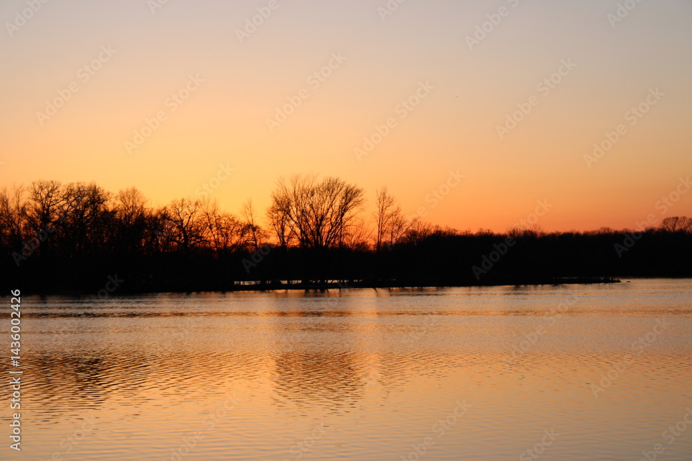 Obraz premium sunset on the river