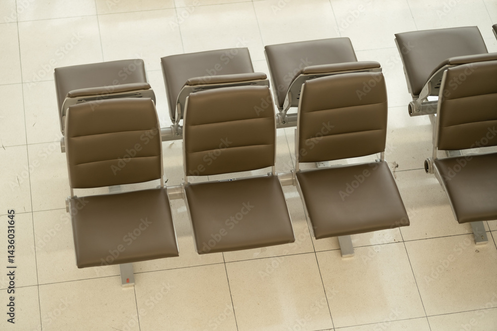 Obraz premium passenger waiting area, comfortable seats in the airport waiting room