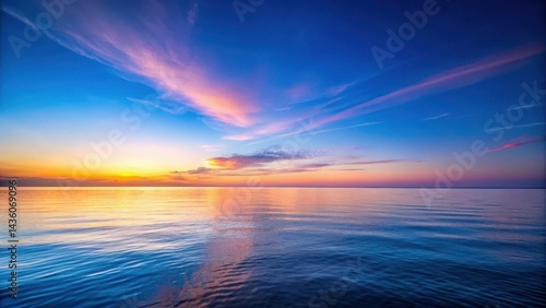 A serene blue hour sky with soft gradient colors blending into the horizon, creating a breathtaking sunset effect, soft gradient, gradual transition