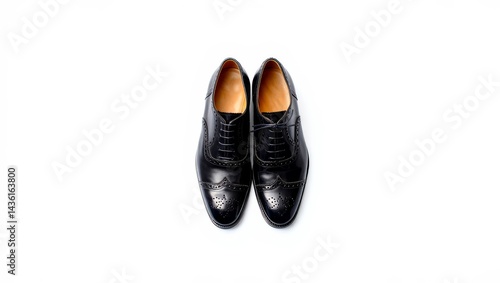 Wallpaper Mural A pair of polished 1930s black oxford shoes with brogue detailing, placed symmetrically on a bright white background, vintage footwear focus Torontodigital.ca