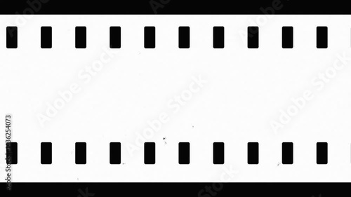 Old film tape overlay with vintage Super 8mm effect. Retro negative grunge background, film strip texture, high quality 4K footage for nostalgic video and photo projects