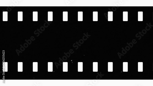 Old film tape overlay with vintage Super 8mm effect. Retro negative grunge background, film strip texture, high quality 4K footage for nostalgic video and photo projects