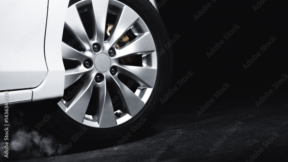Luxury Metallic Car Wheel, Close-up of a alloy wheel with tire of car on black background.