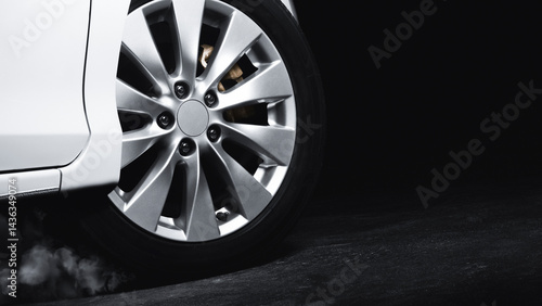 Obraz na płótnie Luxury Metallic Car Wheel, Close-up of a alloy wheel with tire of car on black background. w salonie