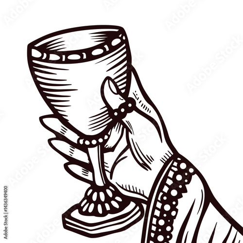 Hand holding ornate chalice with intricate pattern.