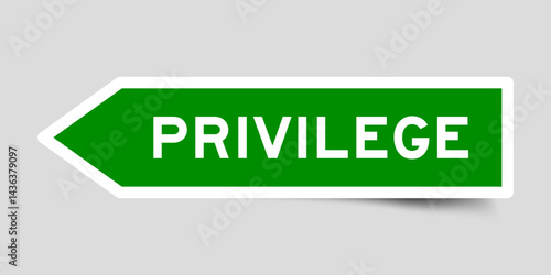Green color arrow shape sticker label with word privilege on gray background