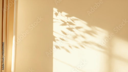Obraz na płótnie light background with blurred foliage shadow on beige wall w salonie