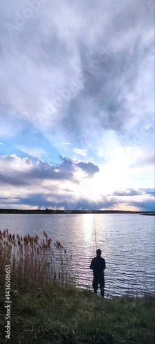 Serene Fishing at Sunset by the Lake