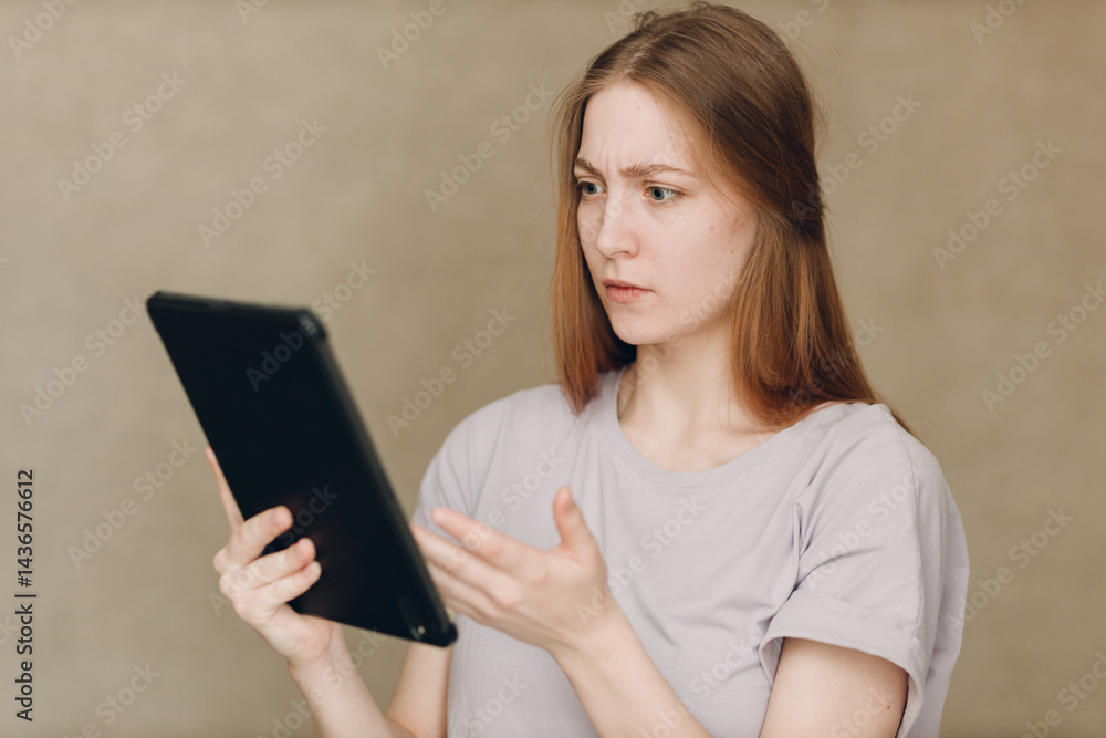 Fototapeta premium Portrait of young student actress learning role woman with digital tablet. Acting test casting film movie acting auditions.