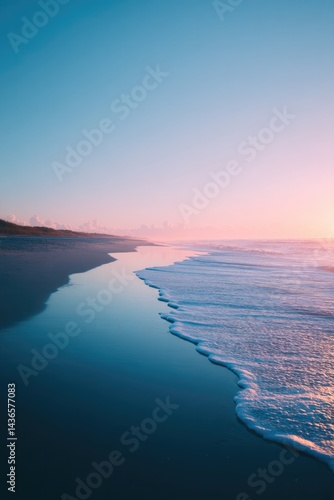 minimalistic image of serene normandy beach at dawn with soft light illuminating gentle waves ample copy space in sky