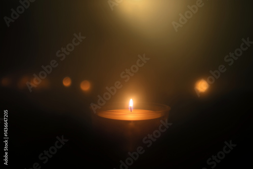 Wallpaper Mural Single candle glowing warmly in dark misty space, soft light illuminating surrounding darkness, concept of hope, memory, prayer, solitude, and peaceful atmospheric background. Torontodigital.ca