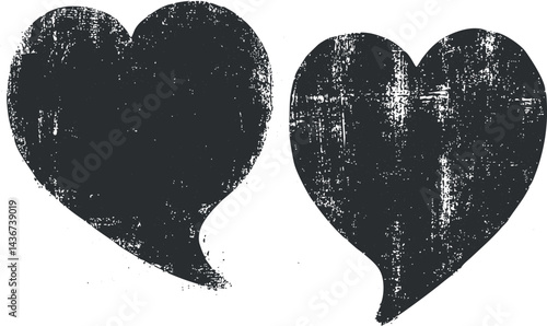 Black grunge textured heart shapes with distressed rough surface isolated on white background