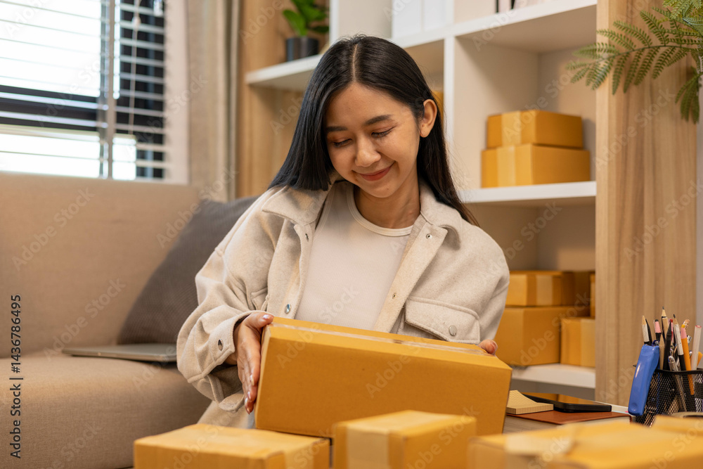 A woman is holding two boxes and smiling. She is sitting in front of a laptop. The boxes are brown and appear to be gifts. The woman seems happy and excited about the boxes
A woman is holding two boxes and smiling. She is sitting in front of a laptop. The boxes are brown and appear to be gifts. The woman seems happy and excited about the boxes